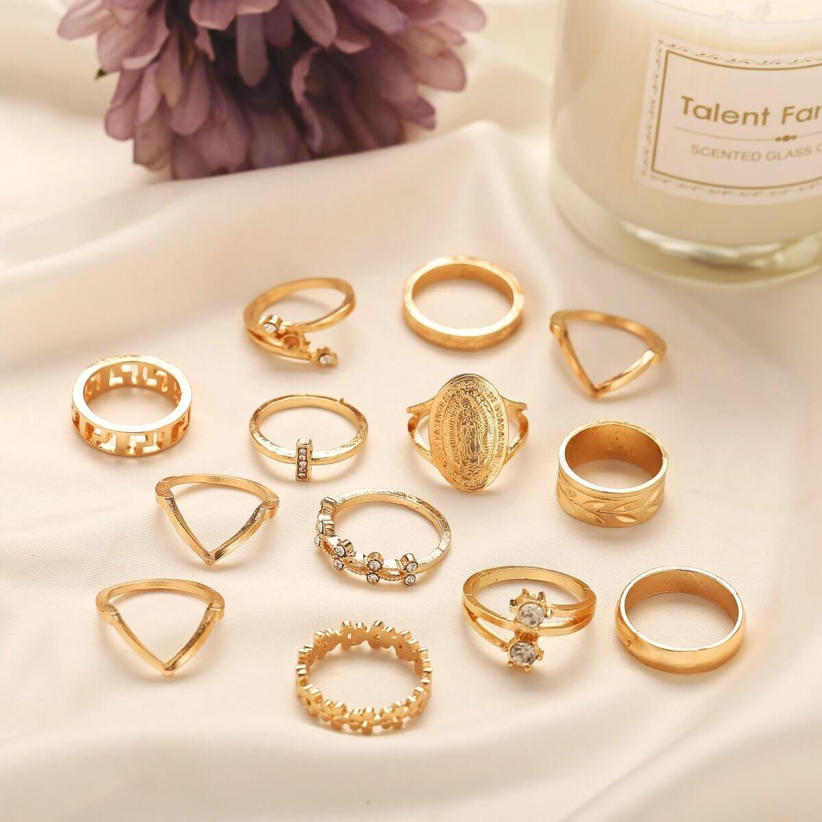The 13-Piece Medallion Ring Set combines elegance and versatility with its intricate designs and shimmering Austrian crystals. Each ring is 18K gold-plated, ensuring a luxurious finish and long-lasting brilliance.