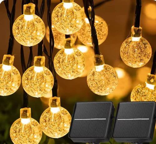 The 60 LED Solar String Lights are the perfect addition to your indoor or outdoor décor, combining functionality with style. Featuring crystal globe lights, these energy-efficient, solar-powered lights offer 8 lighting modes to create the ideal ambiance for any occasion. Built to withstand the elements with a waterproof design, they are perfect for gardens, patios, parties, or holiday decorations. Easy to install and eco-friendly, these string lights add a warm and magical touch to your space, day or night.