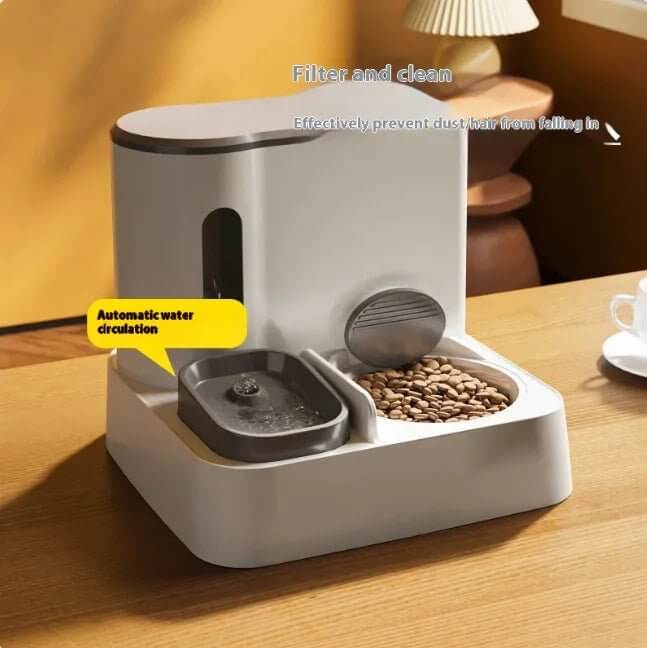 This Automatic Cat Feeder &amp; Water Dispenser features a dual-bowl design, offering a convenient and hygienic way to ensure your furry friend stays well-fed and hydrated.