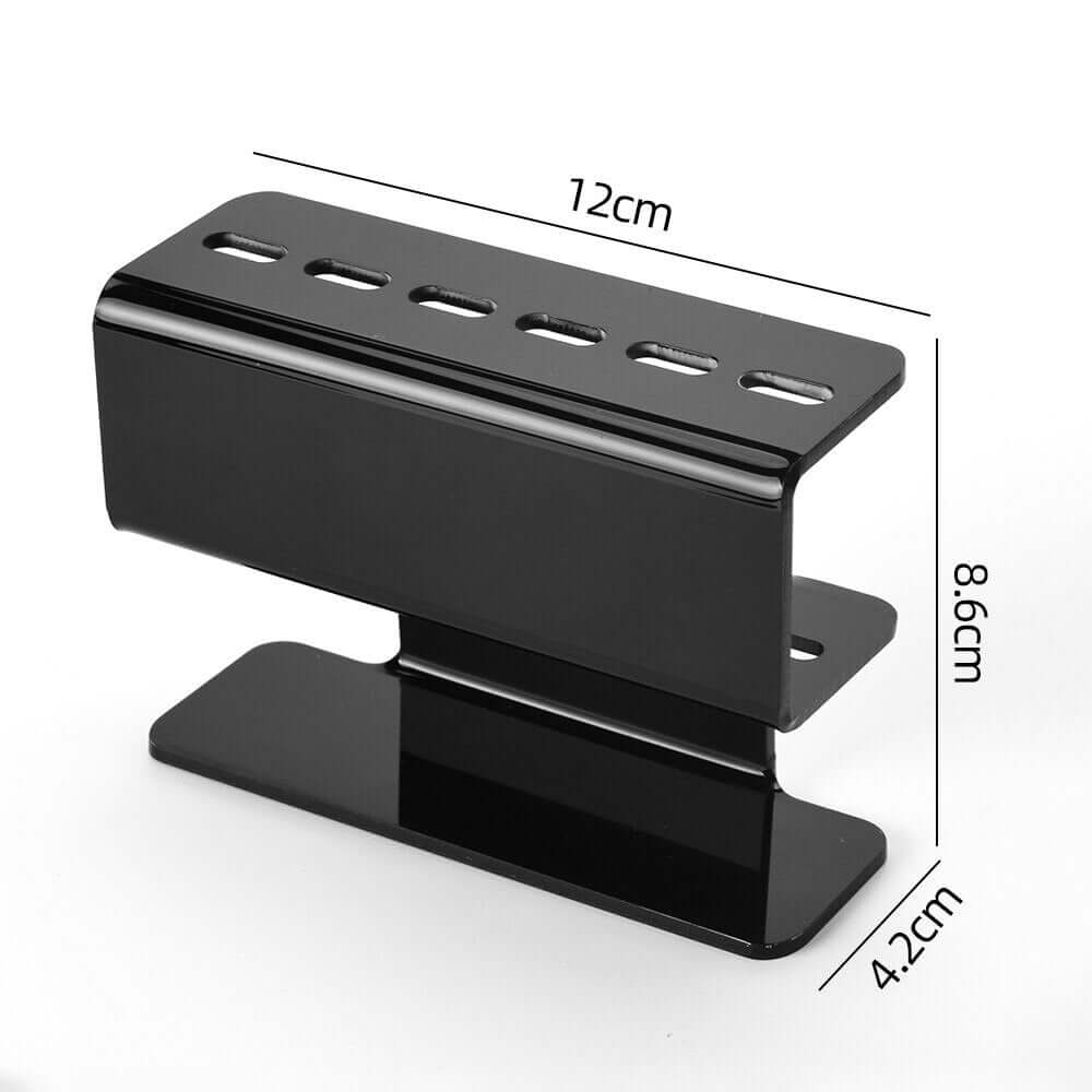 The Acrylic Eyelash Tweezers Holder is the perfect organizer for lash artists and beauty enthusiasts. Crafted from durable, transparent acrylic, this sleek holder keeps your tweezers neatly displayed and easily accessible. Designed to hold multiple tools, it helps maintain a clean, professional workspace while protecting your tweezers from damage. 