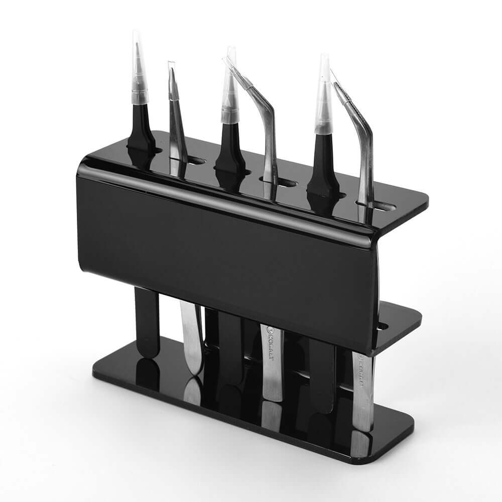 The Acrylic Eyelash Tweezers Holder is the perfect organizer for lash artists and beauty enthusiasts. Crafted from durable, transparent acrylic, this sleek holder keeps your tweezers neatly displayed and easily accessible. Designed to hold multiple tools, it helps maintain a clean, professional workspace while protecting your tweezers from damage. 