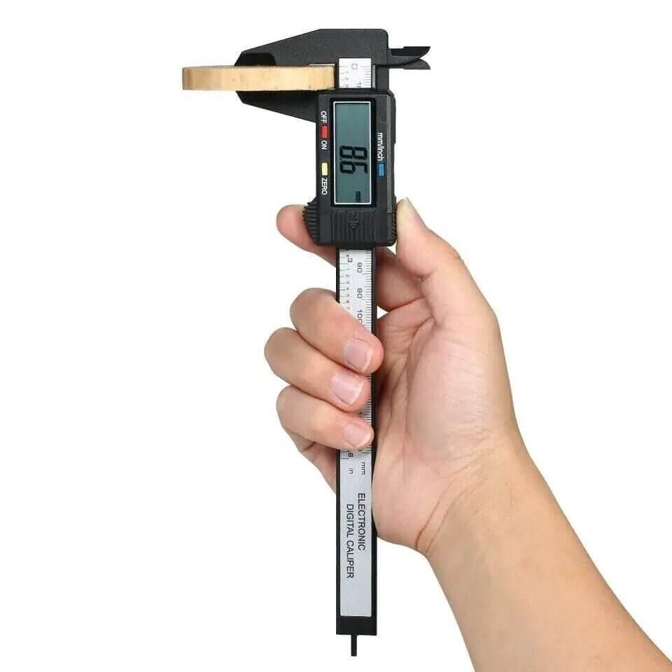 The 6&quot; 150mm Digital Caliper Micrometer is a precision measuring tool designed for accuracy and ease of use. Featuring a clear LCD display, it provides quick and accurate readings in metric or imperial units. This vernier electronic caliper is perfect for measuring inside, outside, depth, and step dimensions, making it ideal for professionals and DIY enthusiasts in engineering, woodworking, and metalworking. Made from durable materials, it ensures long-lasting performance and reliability. 