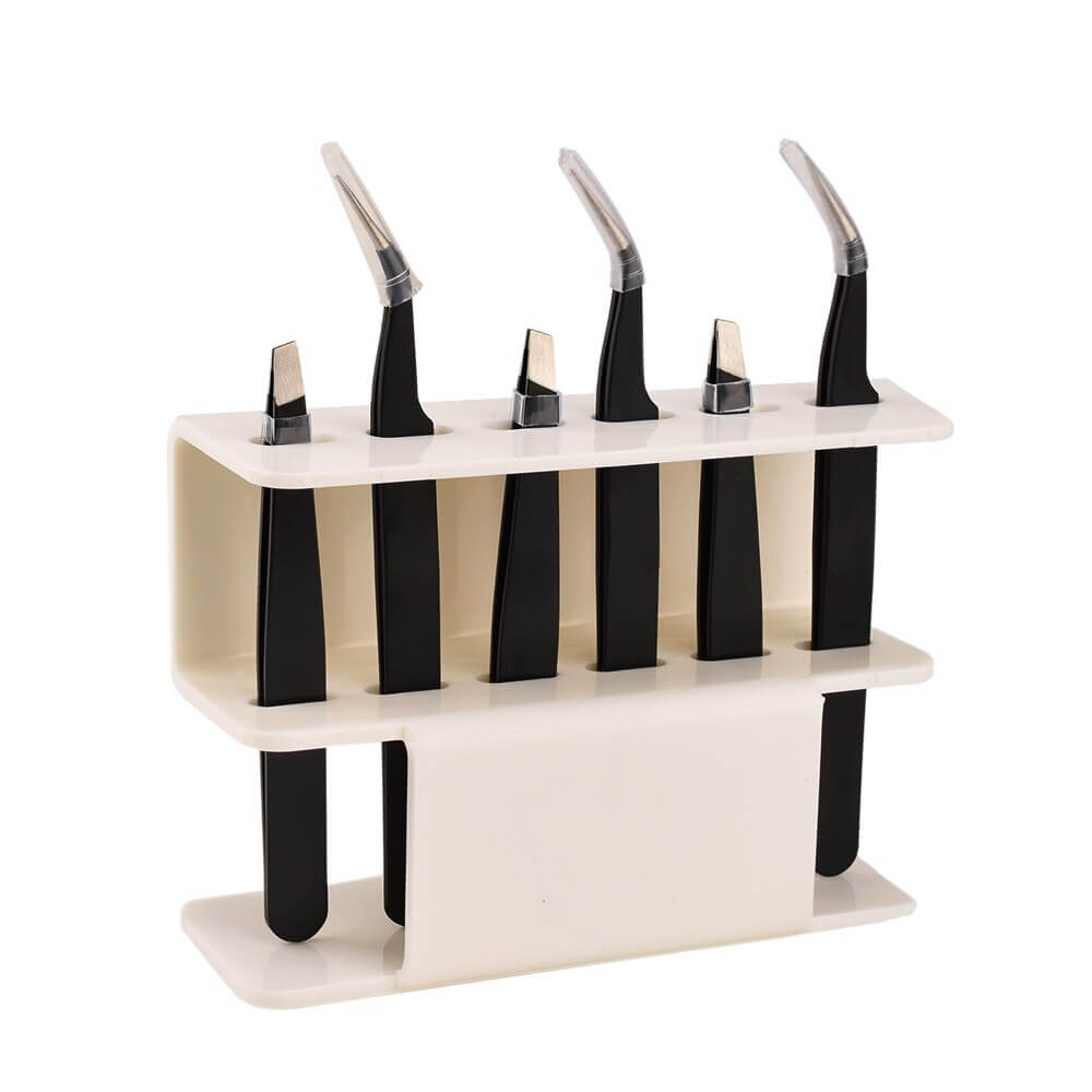 The Acrylic Eyelash Tweezers Holder is the perfect organizer for lash artists and beauty enthusiasts. Crafted from durable, transparent acrylic, this sleek holder keeps your tweezers neatly displayed and easily accessible. Designed to hold multiple tools, it helps maintain a clean, professional workspace while protecting your tweezers from damage. 