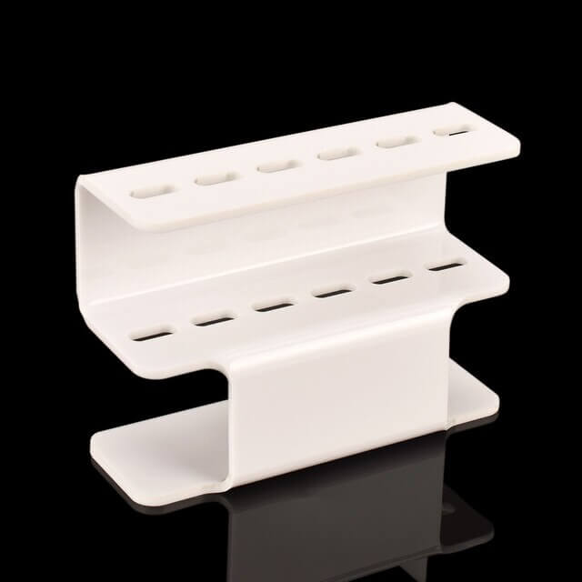 The Acrylic Eyelash Tweezers Holder is the perfect organizer for lash artists and beauty enthusiasts. Crafted from durable, transparent acrylic, this sleek holder keeps your tweezers neatly displayed and easily accessible. Designed to hold multiple tools, it helps maintain a clean, professional workspace while protecting your tweezers from damage. 