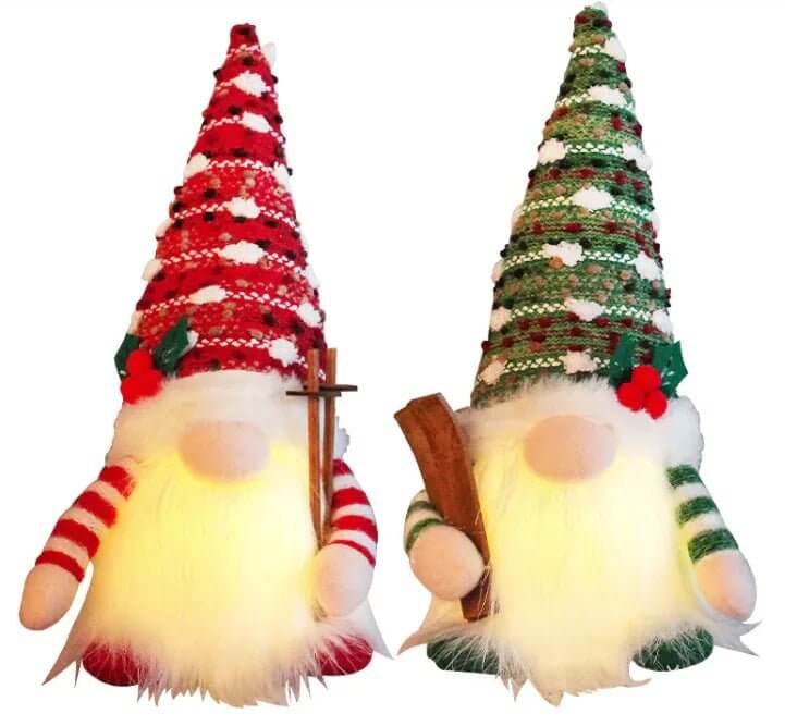 Poupée de Noël en traîneau lumineux