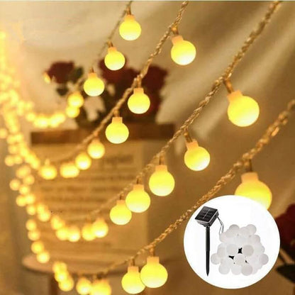 The 60 LED Solar String Lights are the perfect addition to your indoor or outdoor décor, combining functionality with style. Featuring crystal globe lights, these energy-efficient, solar-powered lights offer 8 lighting modes to create the ideal ambiance for any occasion. Built to withstand the elements with a waterproof design, they are perfect for gardens, patios, parties, or holiday decorations. Easy to install and eco-friendly, these string lights add a warm and magical touch to your space, day or night.